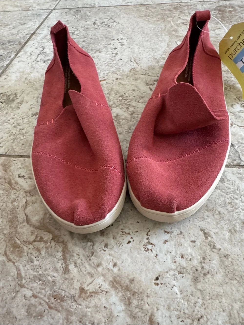 TOMS Women's Slip on sneaker style in Rust colored Red Suede